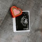 Baby scan print with heart keepsake decoration — sneak peek session at PeekABaby Toronto